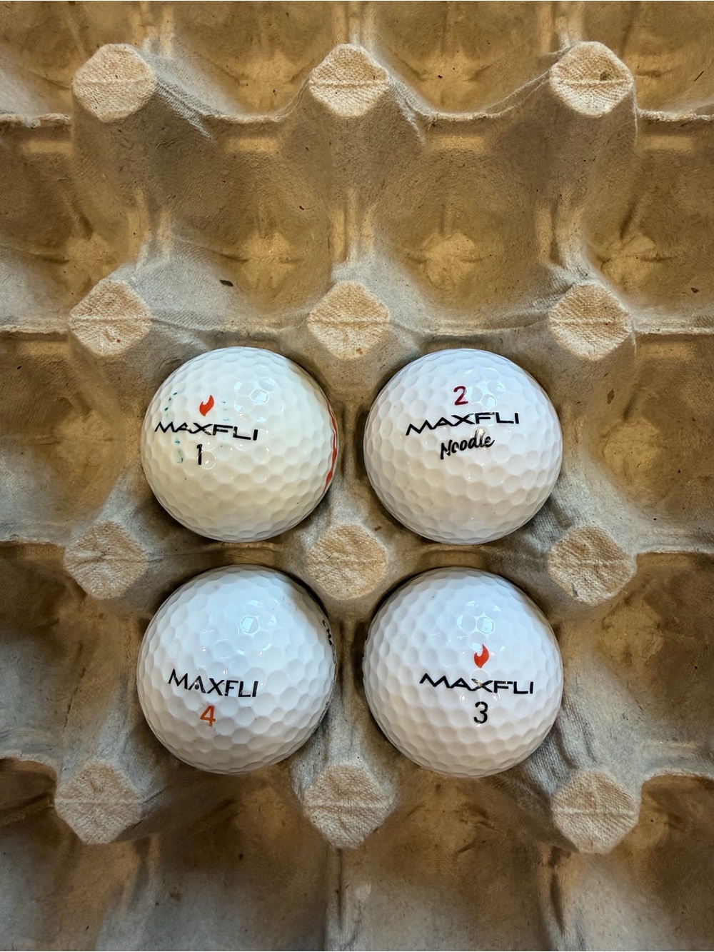 Lot of 4 Maxfli Golf Balls – Fire & Noodle – Used – White – #1-4